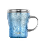 Pure titanium desk mug in frosted blue finish with lid on and curved handle, front view