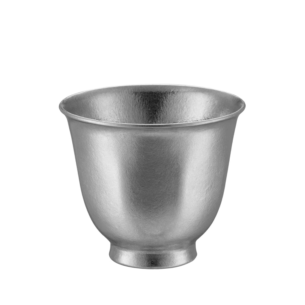 Single polished bright-silver pure titanium tea cup, wide double-wall mouth, front view on white background