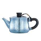 Blue frost-crystal finish titanium teapot, side view with dark African Blackwood handle