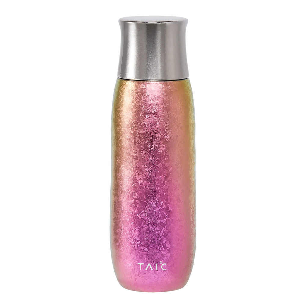 Aurora pure titanium tea infuser tumbler, gold-to-magenta iridescent hammered finish, front view