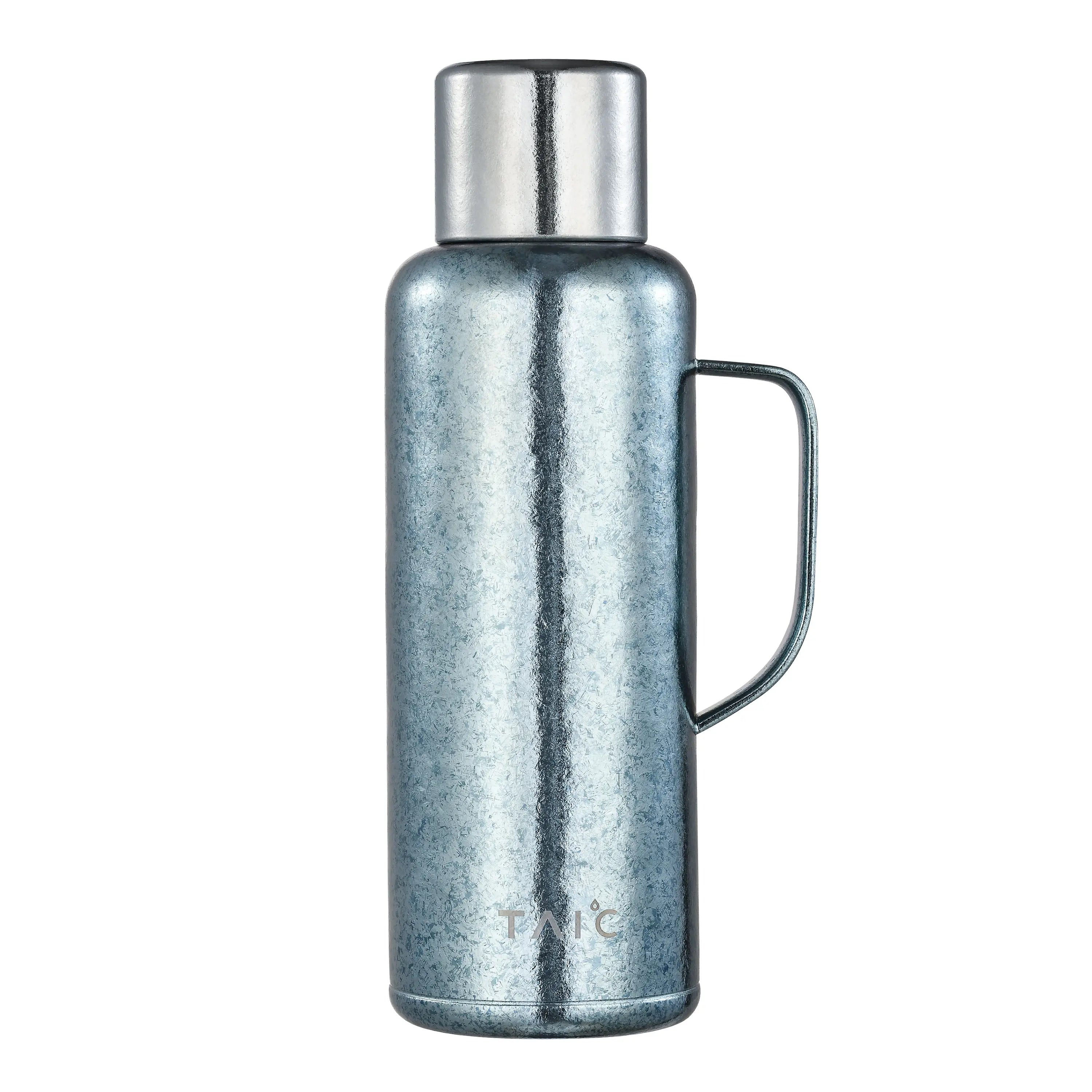 Pure titanium 1.2L thermal carafe in frosted ice-blue crystalline finish with silver cap and handle, front