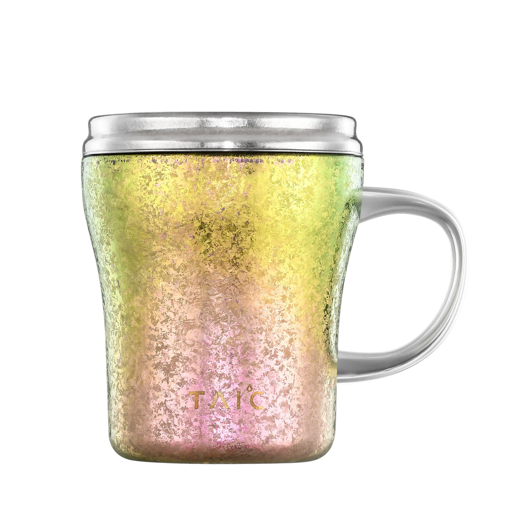 Pure titanium 330mL mug in rainbow green-pink finish, lid closed, front view