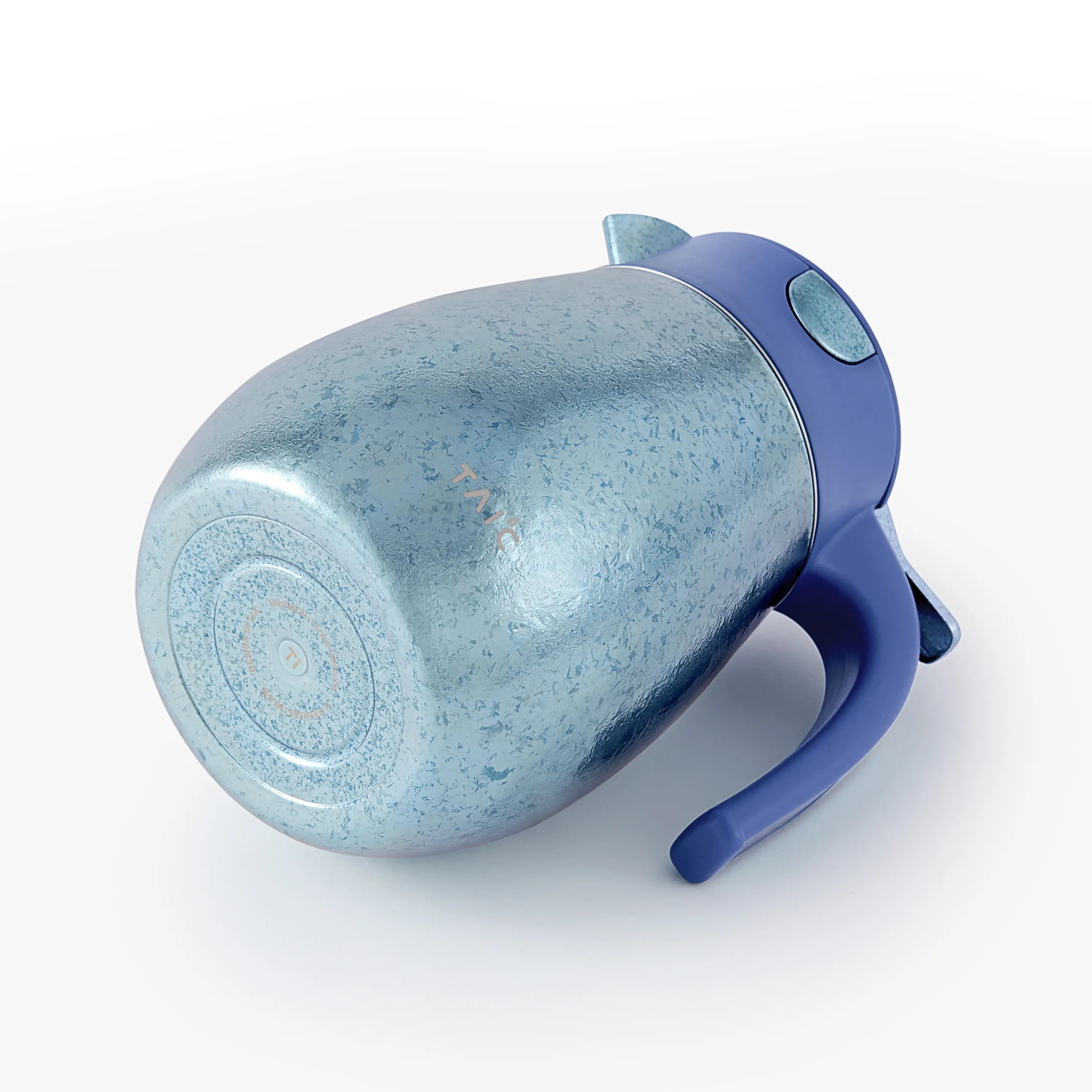 Blue titanium thermal carafe resting on its side, revealing the base with a pure titanium 'Ti' stamp