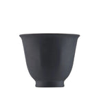 Single charcoal-grey pure titanium tea cup, double-wall flared rim, front view on white background