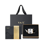 Pure titanium teapot gift set with black presentation box, gold scroll insert and branded tote bag